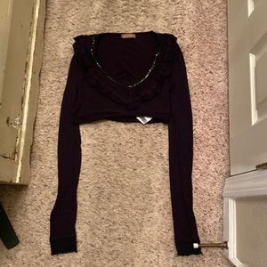 black sweater extremely cropped with ruffles and sequins